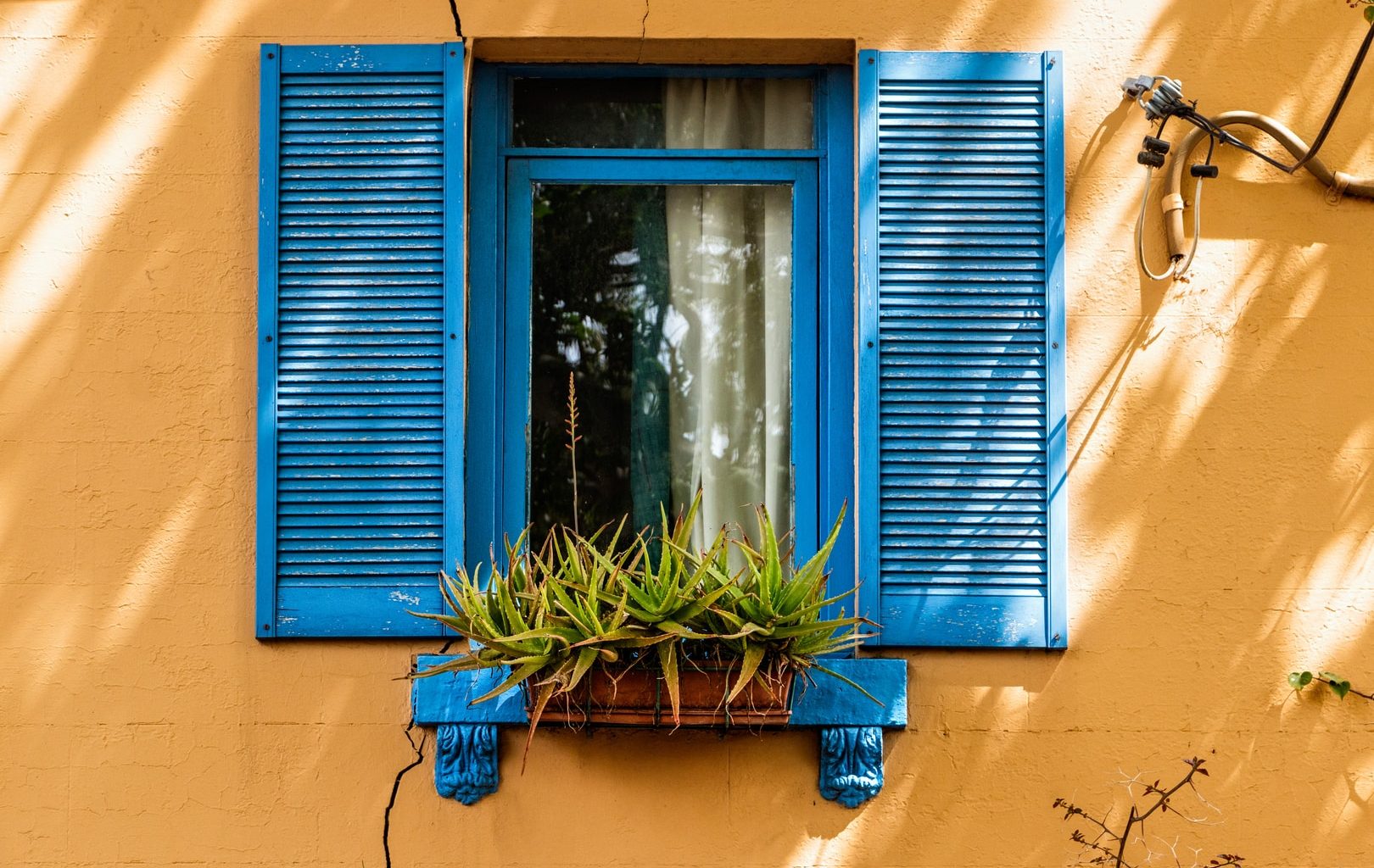 photo of blue open window