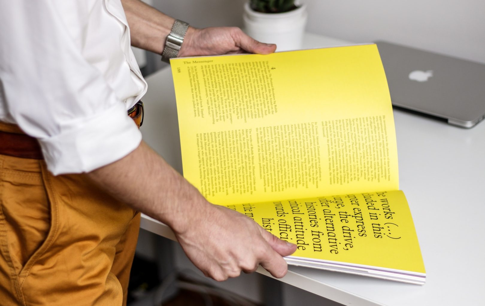 person holding book